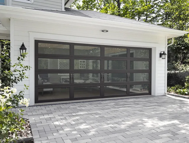 Kennesaw Garage Door Repair design specialist presenting custom garage door options to Kennesaw homeowner