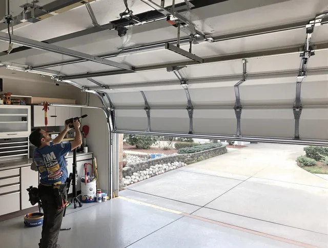 Garage door track repair service by Kennesaw Garage Door Repair in Kennesaw